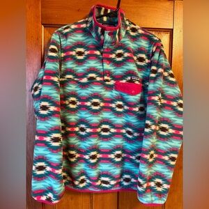 Patagonia Synchilla Snap-T fleece pullover with a vibrant Aztec pattern